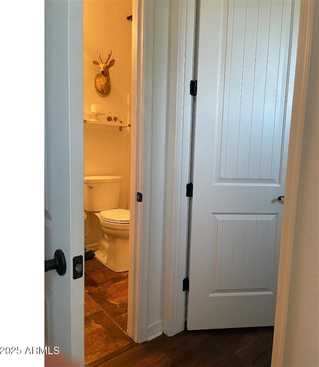20502 W Ridge Rd, Buckeye, AZ 85396 - bathroom featuring toilet and wood finished floors