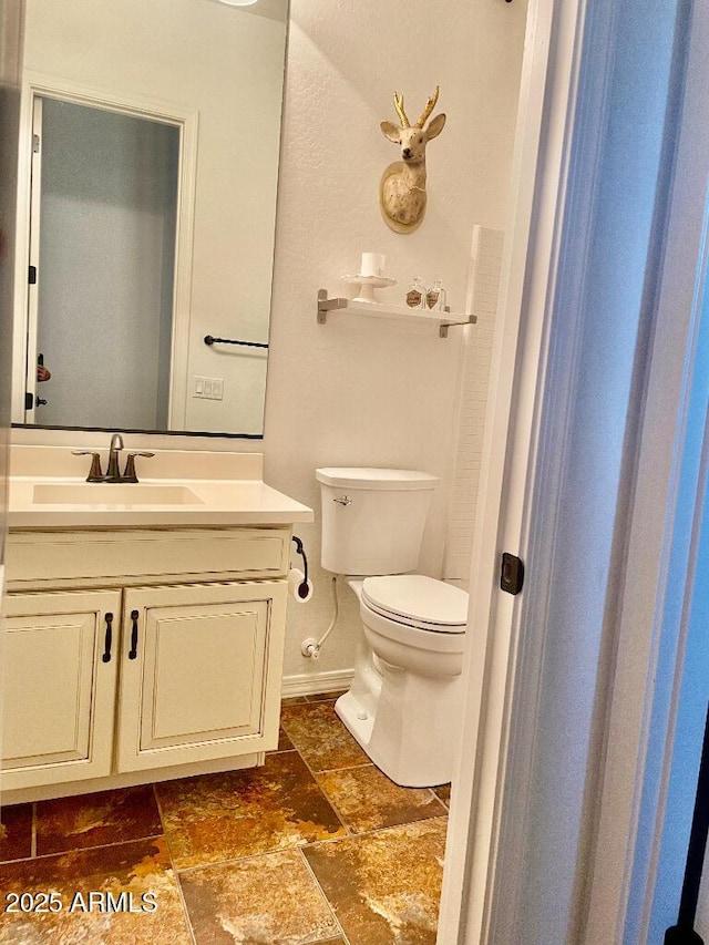 20502 W Ridge Rd, Buckeye, AZ 85396 - bathroom featuring vanity and stone finish floors