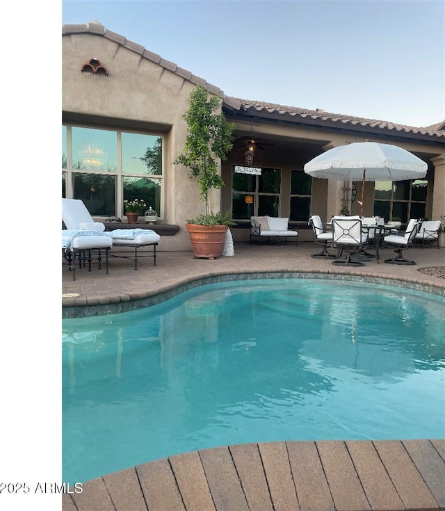 20502 W Ridge Rd, Buckeye, AZ 85396 - swimming pool with a patio area and an outdoor hangout area