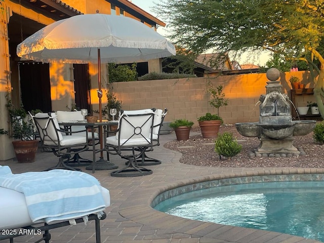 20502 W Ridge Rd, Buckeye, AZ 85396 - view of pool featuring a patio area and outdoor dining area
