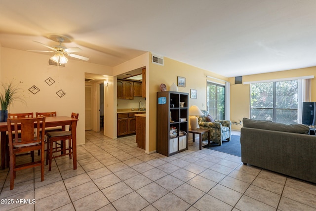 3131 W Cochise Dr Unit 144, Phoenix, AZ 85051 - living room with light tile patterned flooring and a ceiling fan