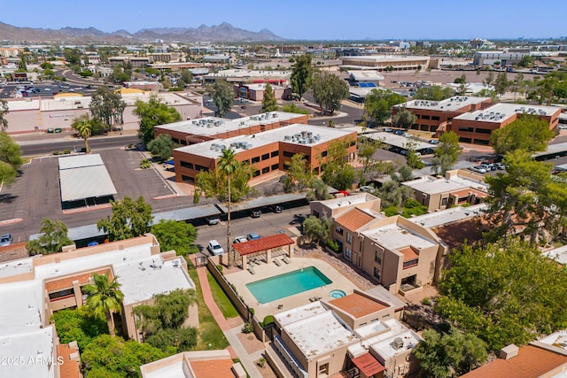 3131 W Cochise Dr Unit 144, Phoenix, AZ 85051 - bird's eye view of a pool and a mountain backdrop