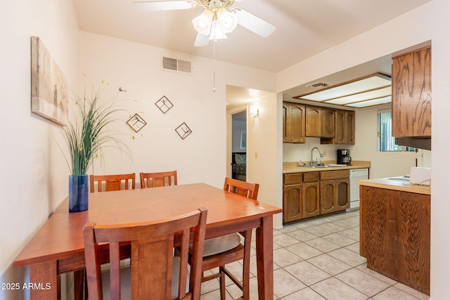 3131 W Cochise Dr Unit 144, Phoenix, AZ 85051 - dining room featuring a ceiling fan and light tile patterned floors