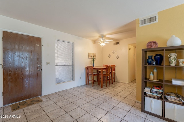 3131 W Cochise Dr Unit 144, Phoenix, AZ 85051 - dining area featuring light tile patterned floors and a ceiling fan