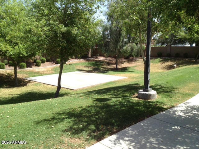 view of community featuring a lawn