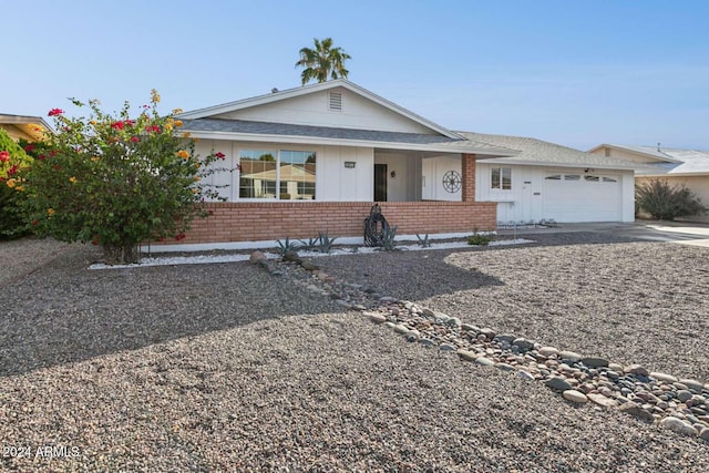 single story home with a garage