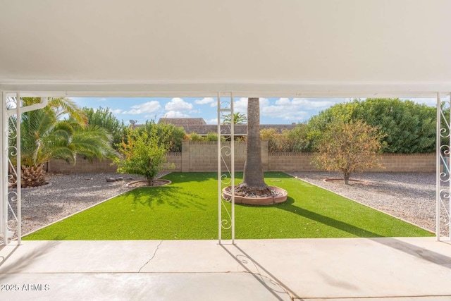 view of yard with a patio area