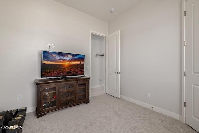 bedroom featuring carpet flooring and baseboards