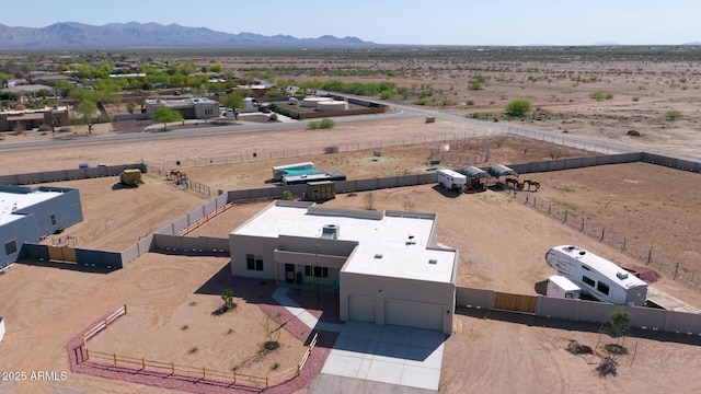 bird's eye view with a rural view, a mountain view, and a desert view