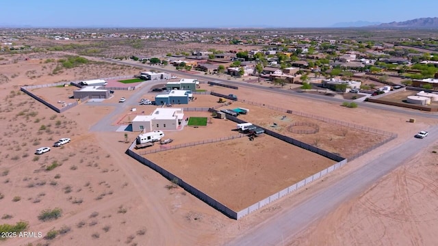 aerial view featuring a mountain view and a residential view
