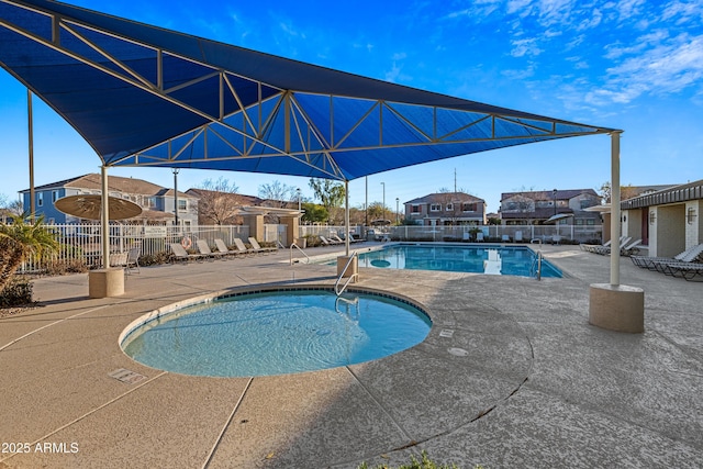 view of swimming pool with a patio area