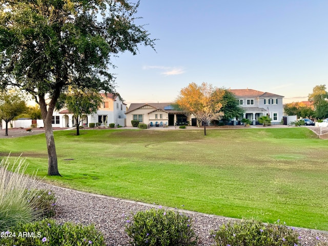 surrounding community featuring a lawn