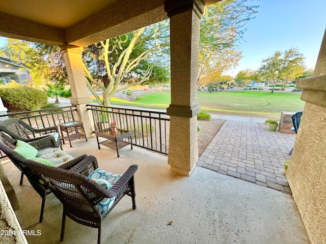 view of patio featuring a porch