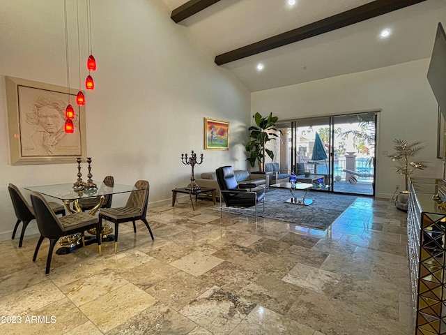 10068 E Turquoise Ave, Scottsdale, AZ 85258 - living area with baseboards, high vaulted ceiling, beam ceiling, and stone tile flooring
