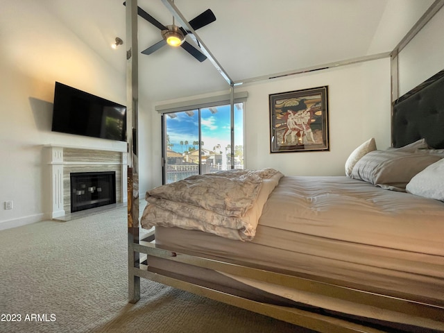 10068 E Turquoise Ave, Scottsdale, AZ 85258 - bedroom featuring access to exterior, high vaulted ceiling, carpet flooring, a ceiling fan, and a fireplace with flush hearth