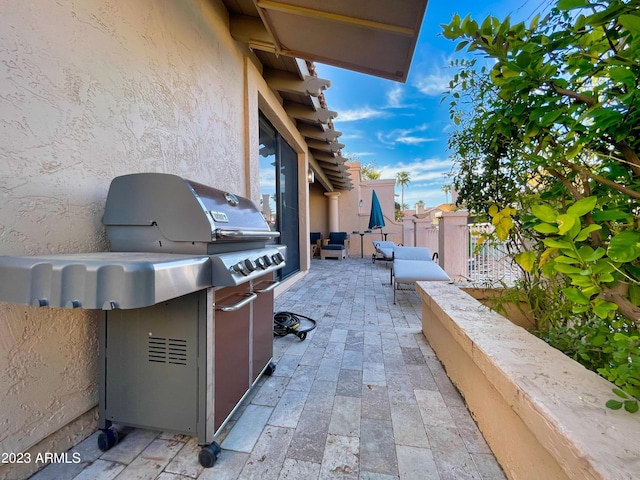 10068 E Turquoise Ave, Scottsdale, AZ 85258 - view of patio featuring a grill and fence