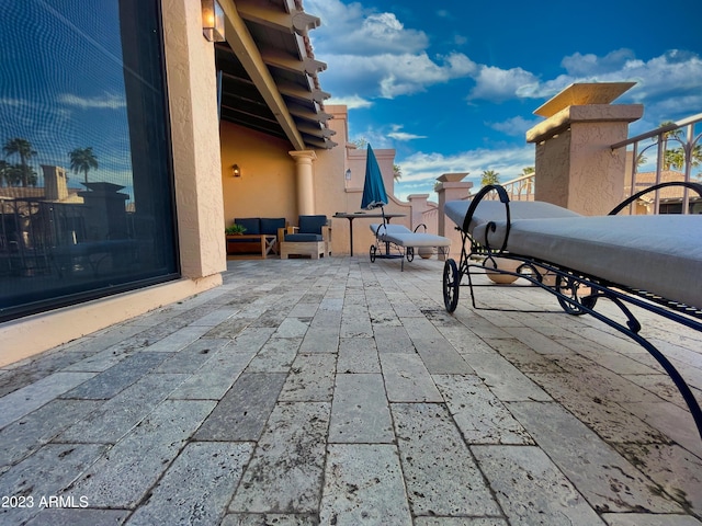 10068 E Turquoise Ave, Scottsdale, AZ 85258 - view of patio / terrace featuring an outdoor living space