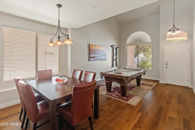 dining area with baseboards, pool table, a healthy amount of sunlight, and wood-type flooring