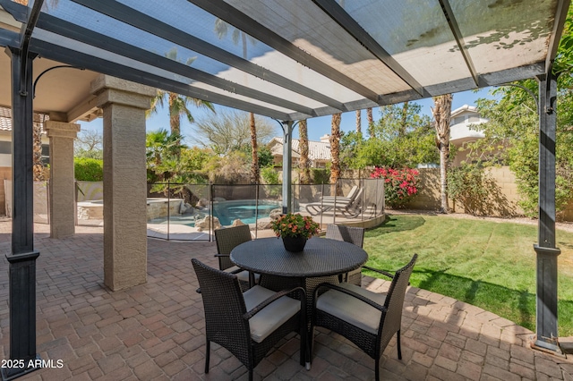 view of patio with a fenced backyard, a fenced in pool, and outdoor dining area