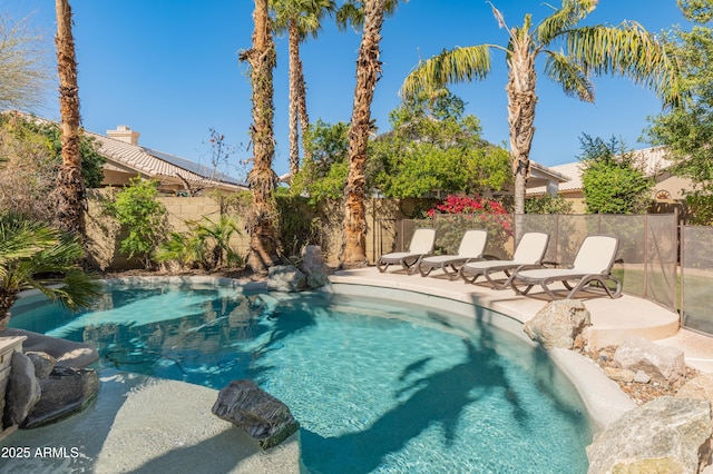 view of pool featuring a fenced backyard, a patio, and a fenced in pool