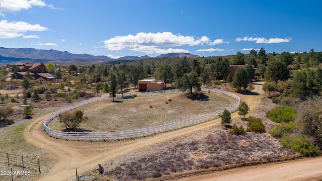 bird's eye view featuring a mountain view and a rural view