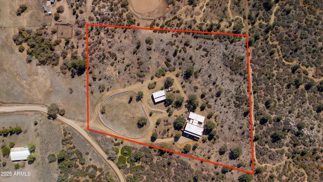 bird's eye view with a rural view and view of desert