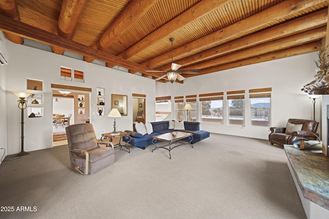 carpeted living area featuring a high ceiling, a ceiling fan, and beamed ceiling