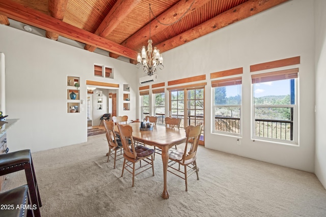 dining space featuring beamed ceiling, plenty of natural light, wooden ceiling, and carpet floors