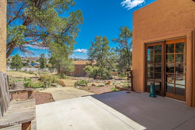view of patio / terrace featuring a fenced backyard and french doors