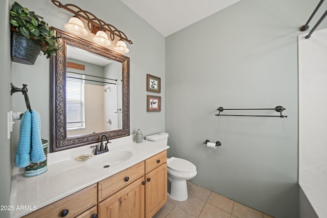 full bathroom with lofted ceiling, tile patterned floors, toilet, vanity, and walk in shower