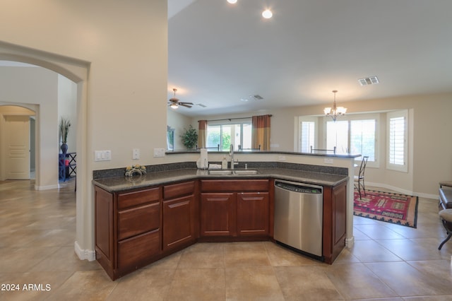 kitchen featuring light tile patterned floors, dishwasher, decorative light fixtures, ceiling fan with notable chandelier, and sink