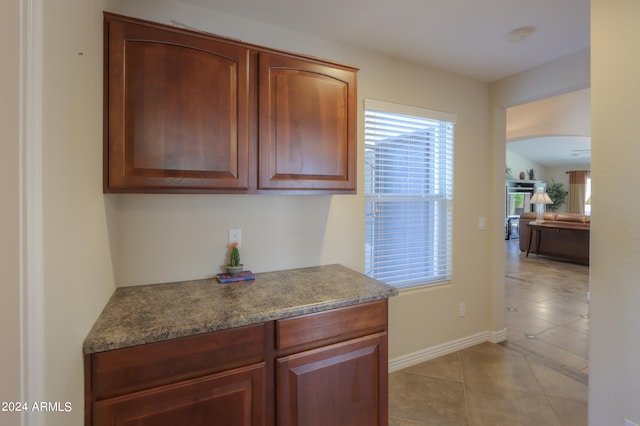 kitchen with light tile patterned floors