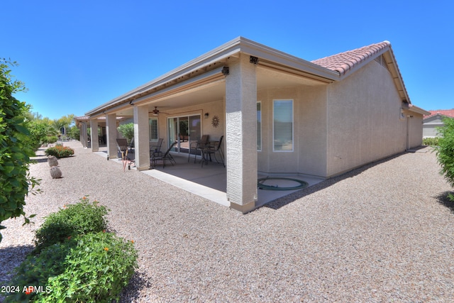 back of property with a patio area