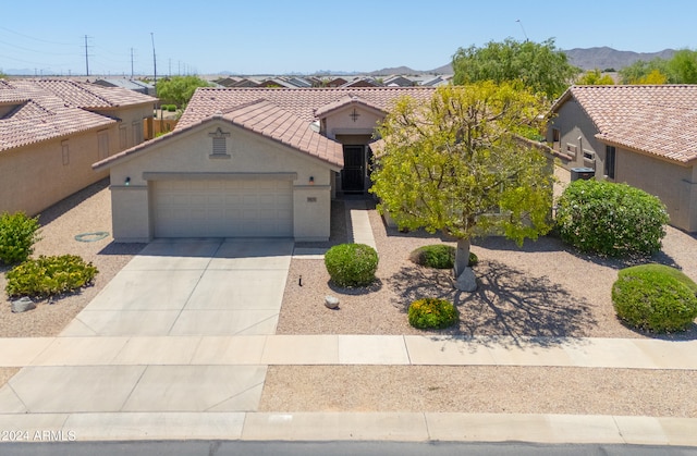 view of front of property with a mountain view