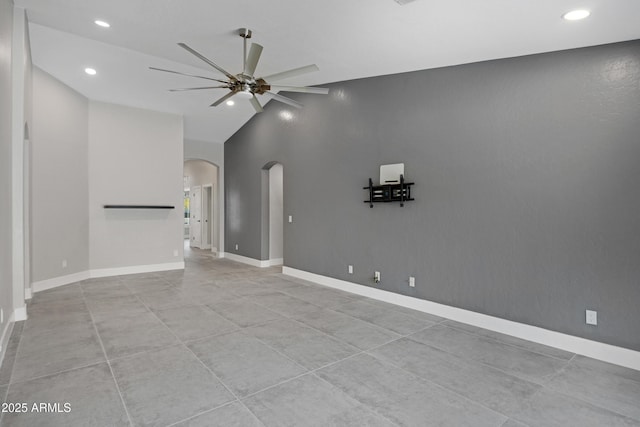 unfurnished living room featuring lofted ceiling and ceiling fan