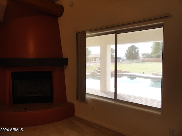 unfurnished living room featuring a fireplace