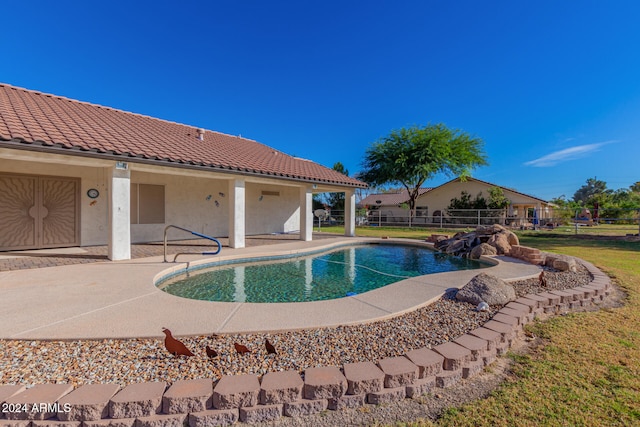 view of pool with a patio