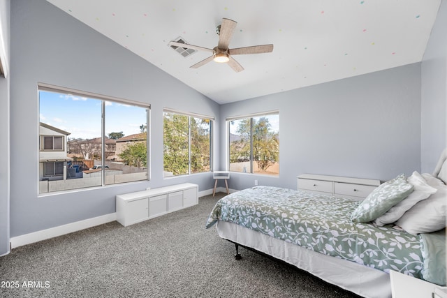 bedroom featuring carpet floors, baseboards, multiple windows, and visible vents