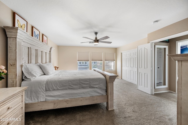 bedroom with carpet, ceiling fan, and baseboards