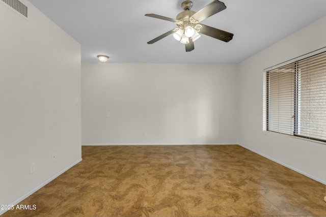 unfurnished room featuring light colored carpet and ceiling fan