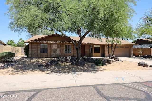4516 E Willow Ave, Phoenix, AZ 85032 - ranch-style home with a garage, concrete driveway, and brick siding