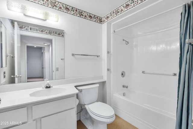 full bathroom with shower / tub combo, vanity, and toilet