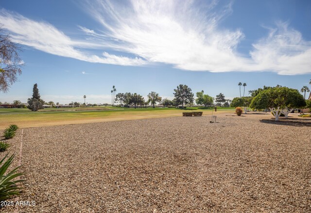 view of home's community featuring a lawn