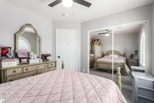 bedroom featuring ceiling fan and carpet floors