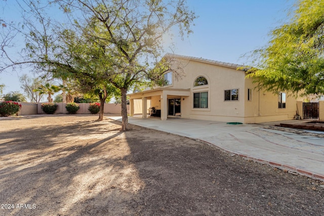 rear view of house with a patio area