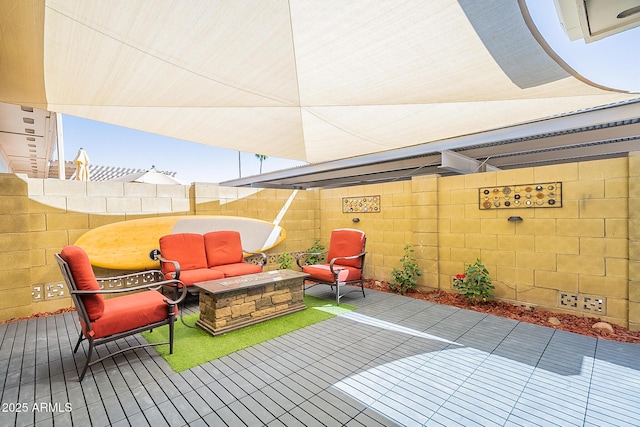 view of patio / terrace featuring a fire pit