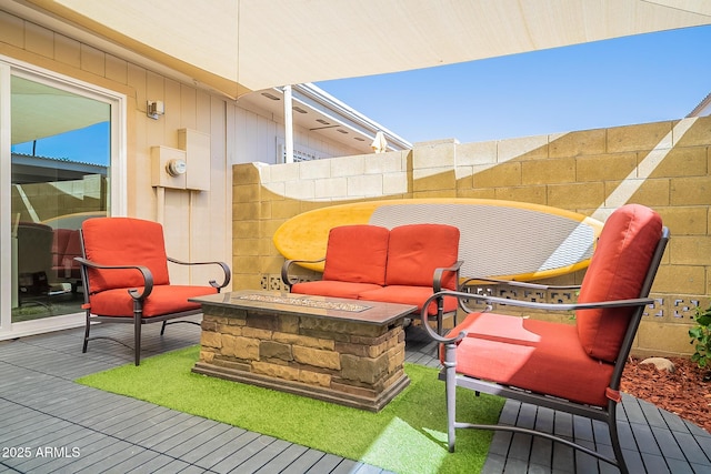 exterior space featuring an outdoor fire pit