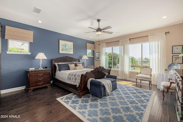 bedroom featuring dark wood-type flooring and ceiling fan