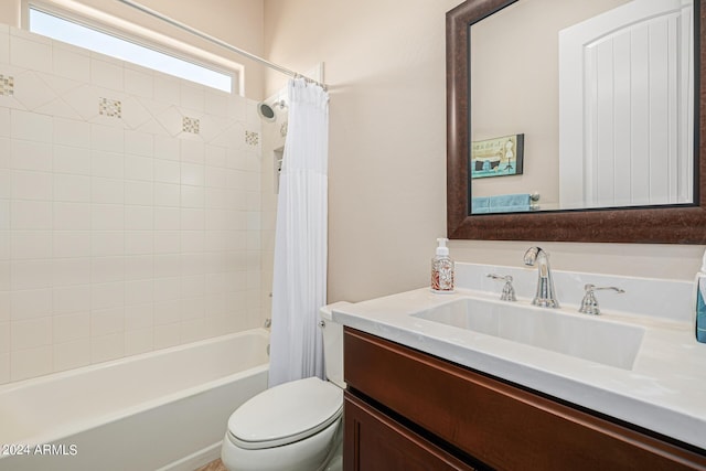 full bathroom featuring toilet, vanity, and shower / bathtub combination with curtain