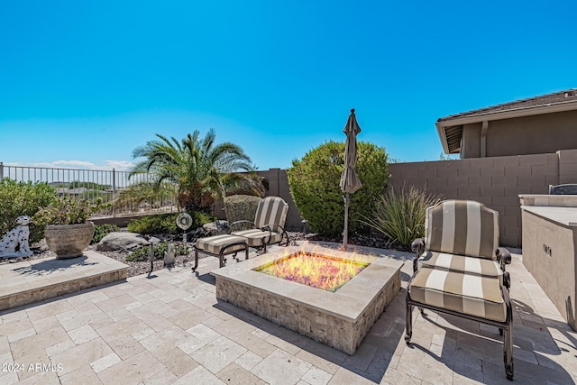 view of patio / terrace with a fire pit